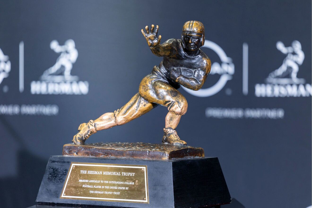 The Heisman Trophy is displayed before the finalists spoke at a...