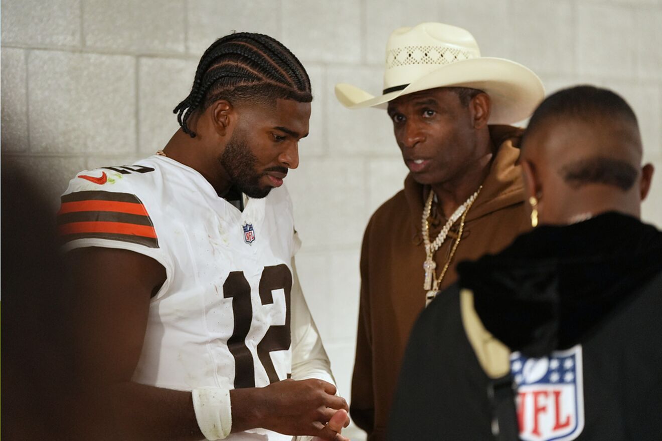 Cleveland Browns quarterback Shedeur Sanders (12) speaks with his...