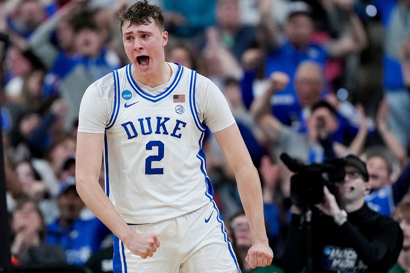 Cooper Flagg reacts after dunking during an NCAA Tournament game.