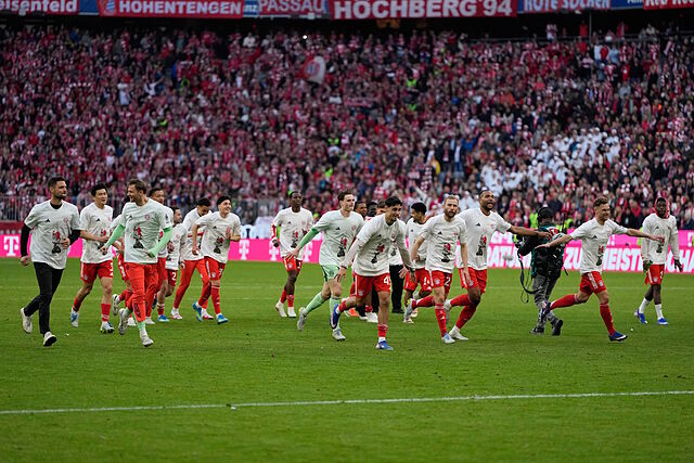 Bayern players celebrate after their team clinched the German league title.