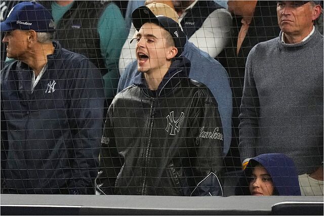 Chalamet reacts while watching Game 4 of baseball's ALDS between the  Yankees and the Blue Jays,