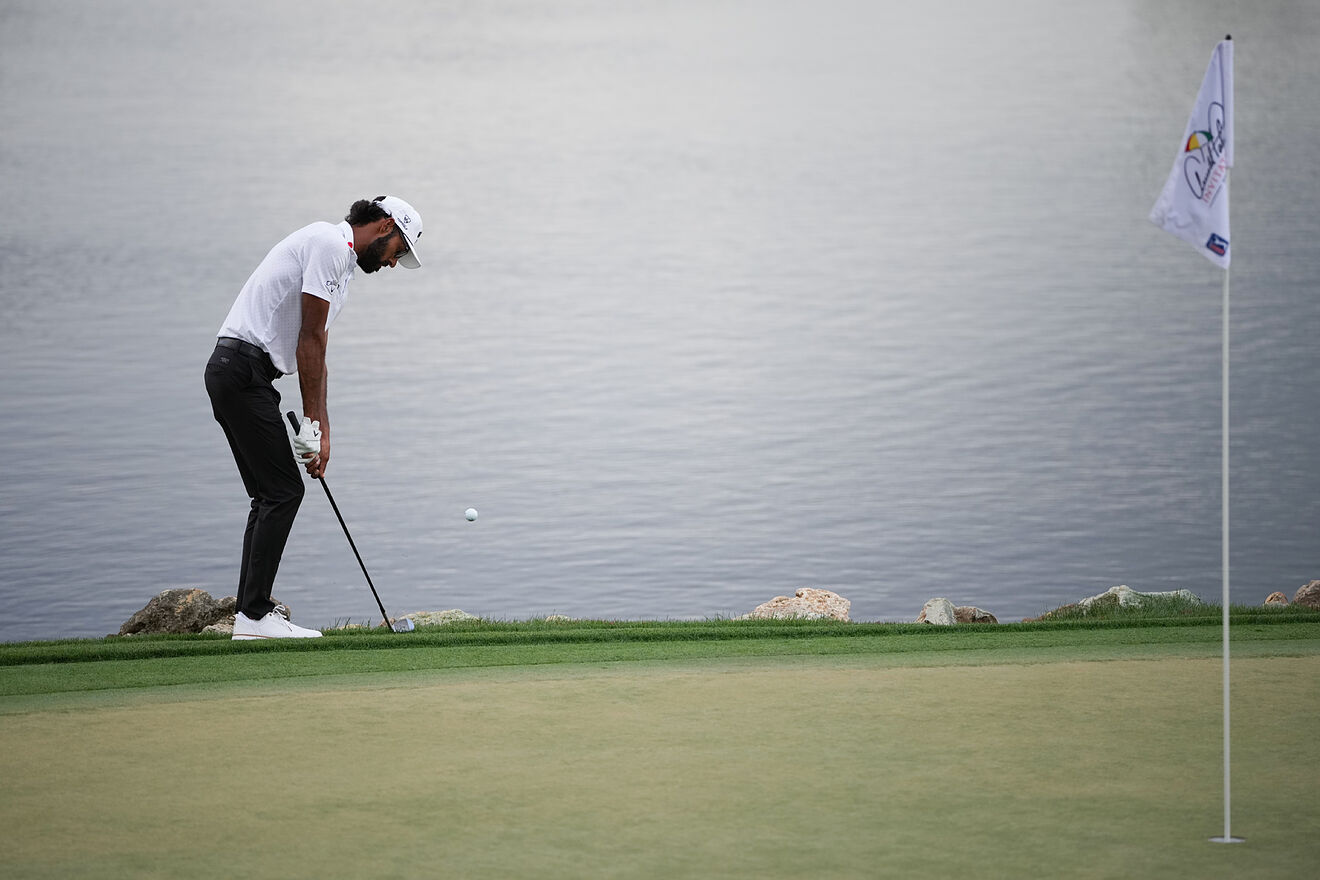 Akshay Bhatia hits on the 18th hole during the final round of the...