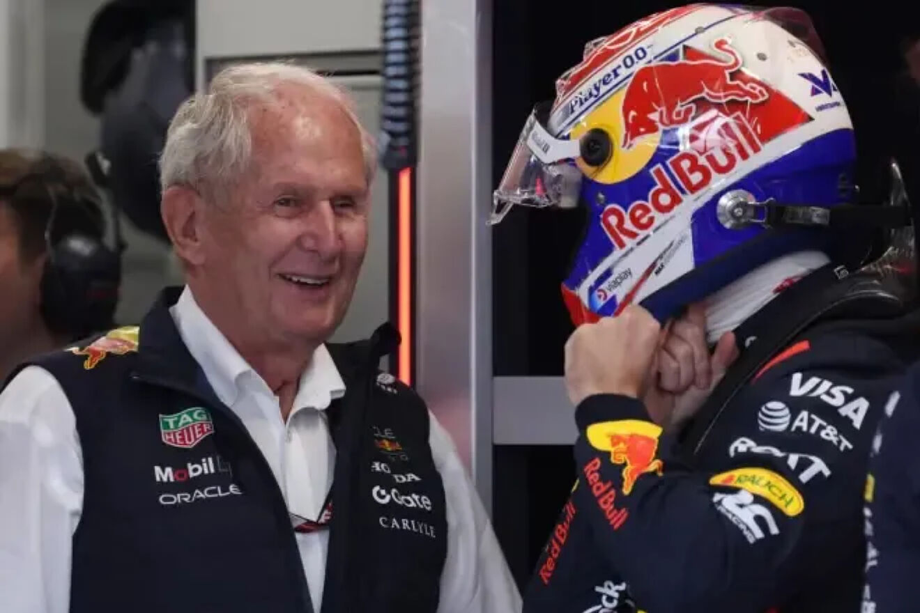 Marko chats with Verstappen.