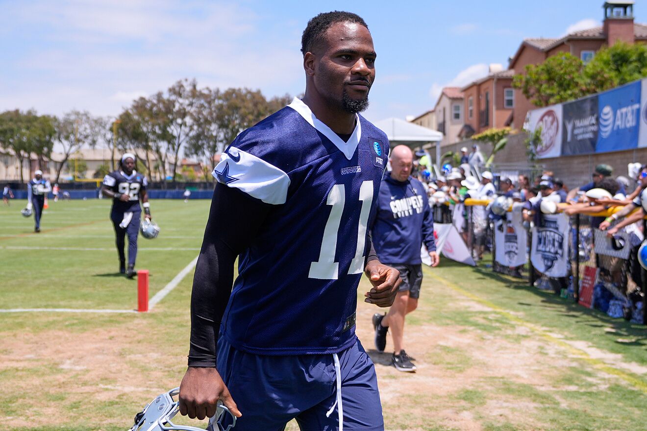 Micah Parsons walks off the field during a Dallas Cowboys training...