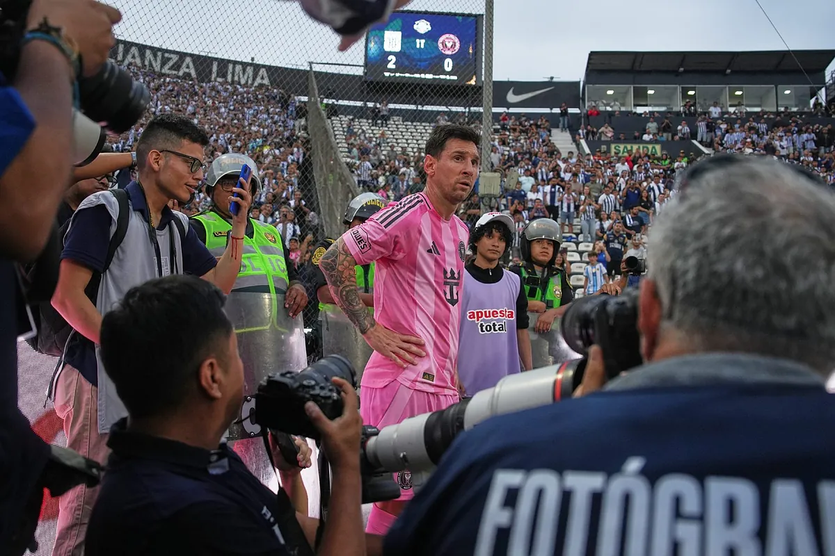 Lionel Messi reacts as a photographer crosses the line during an Inter Miami match abroad