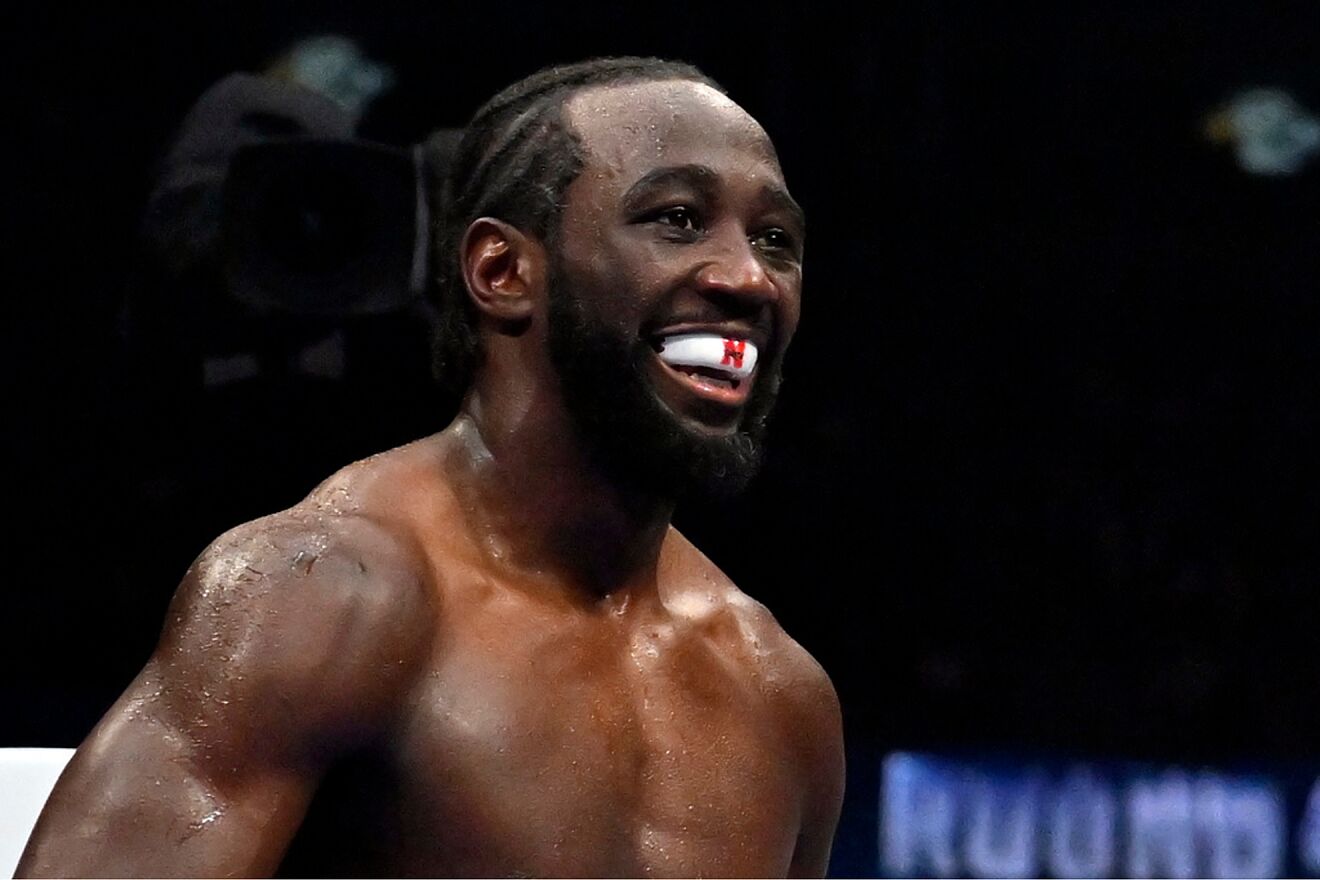 Terence Crawford looks on during his undisputed super middleweight...