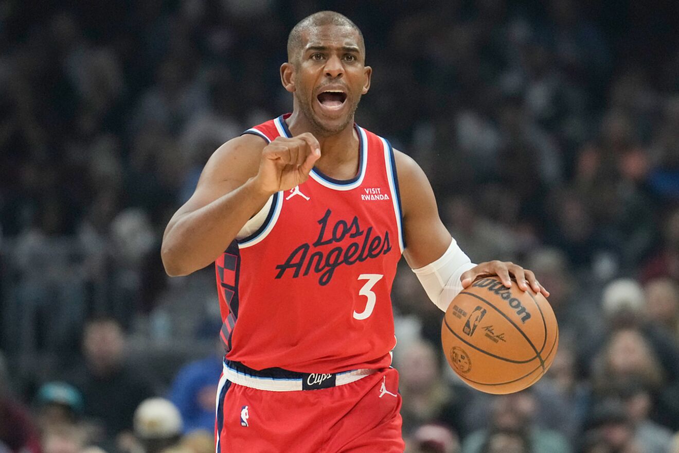 Los Angeles Clippers guard Chris Paul (3) shouts to his team as he...