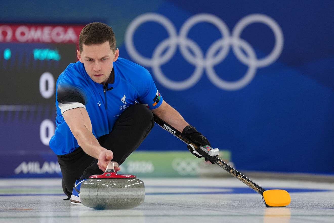 Estonia's Harri Lill in action during the mixed doubles round robin...