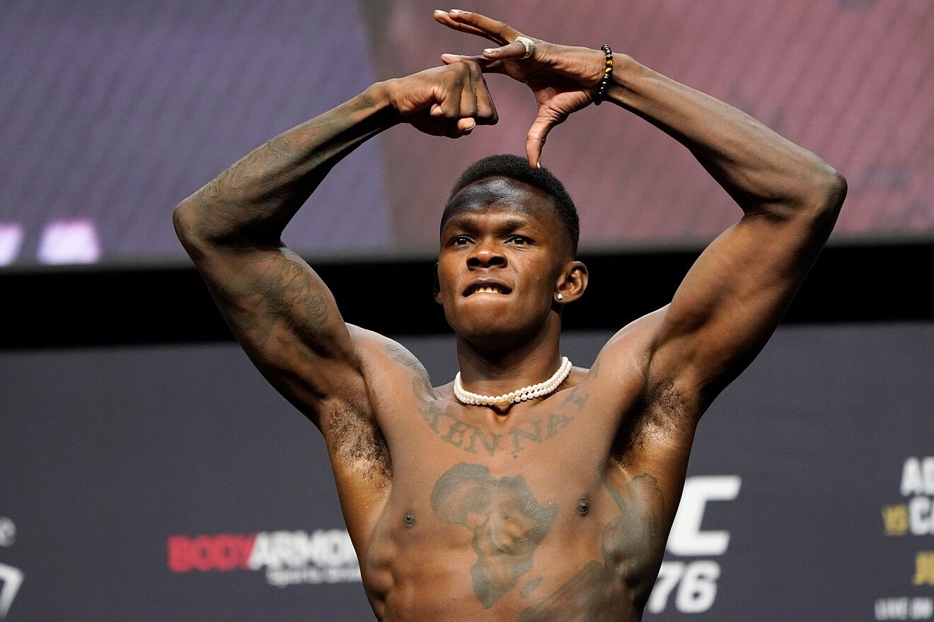 Israel Adesanya poses during a ceremonial weigh-in Friday, July 1,...