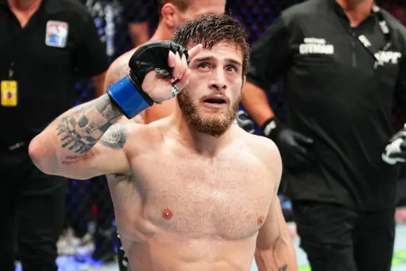 Aleksandre Topuria celebrates his win at UFC 312.