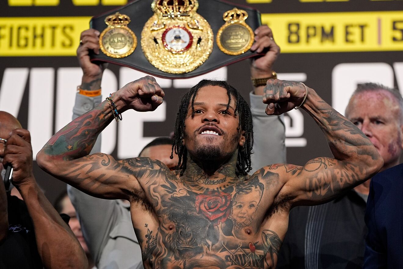 Gervonta Davis poses on the scale during a weigh-in Friday, June 14,...
