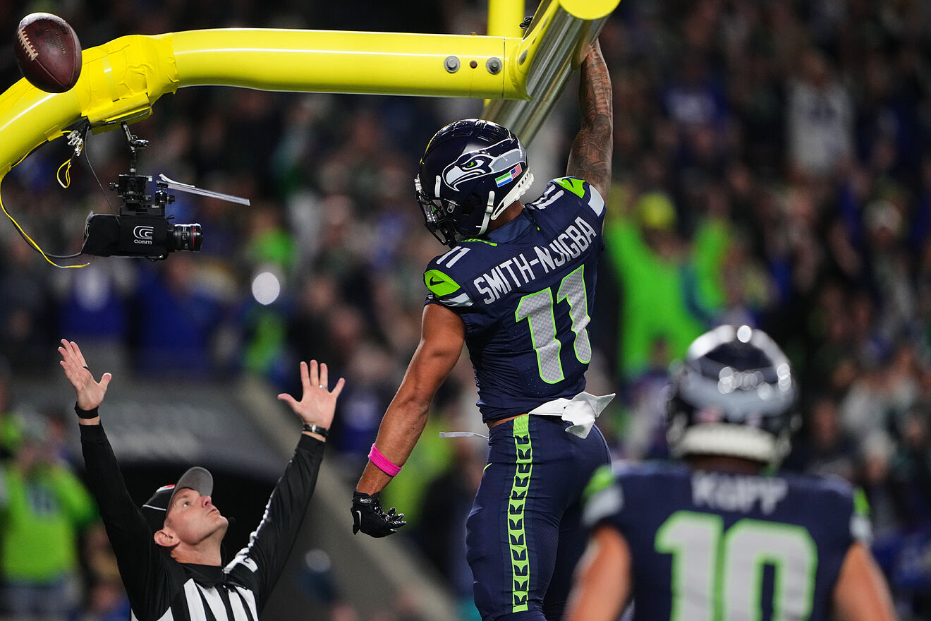 Seattle Seahawks wide receiver Jaxon Smith-Njigba (11) celebrates his...