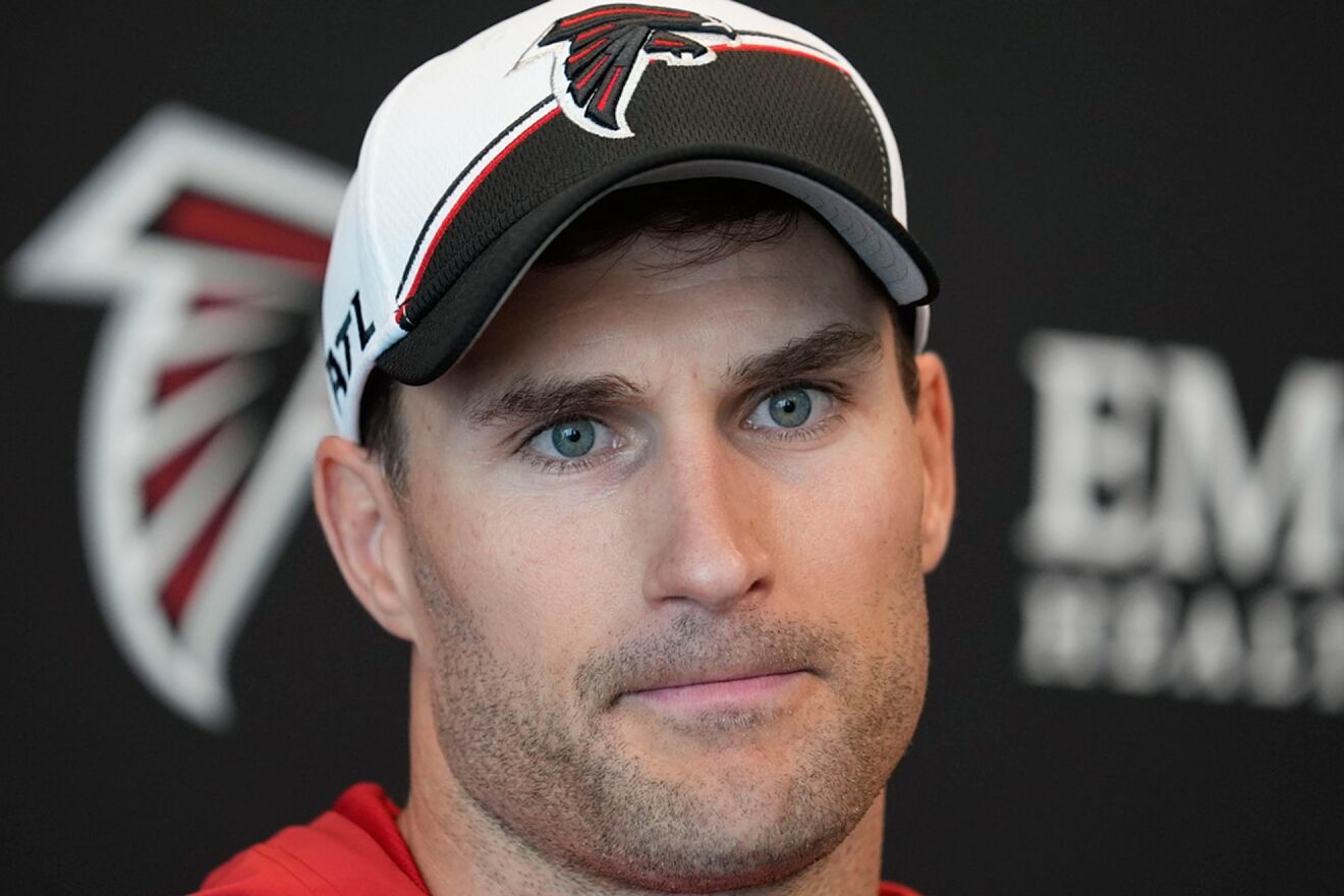 Kirk Cousins speaks during a news conference after an NFL football...