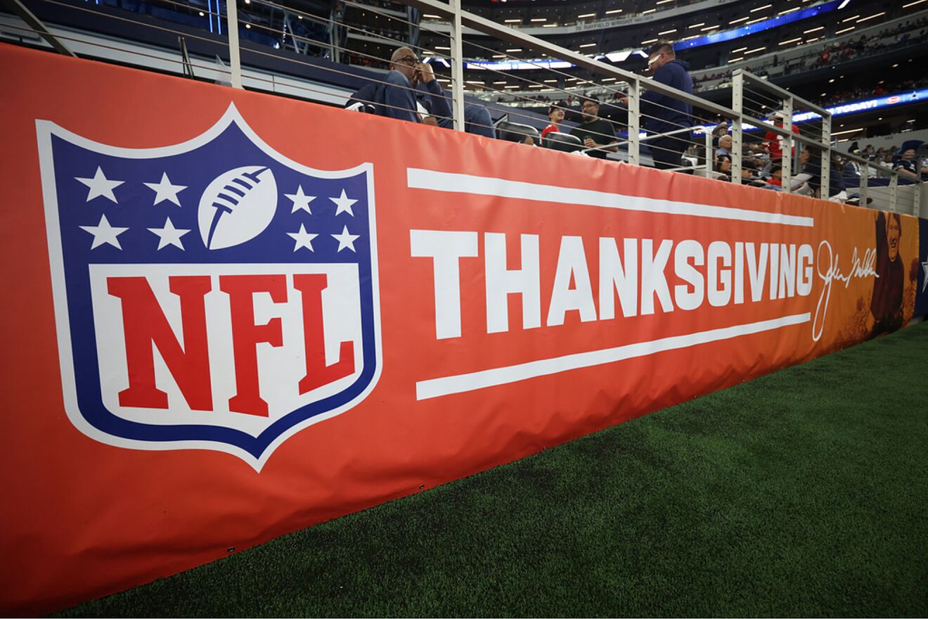 A Thanksgiving sign is seen around the field before an NFL football...