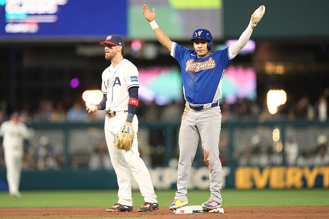 Venezuela Javier Sanoja gestures after stealing second base