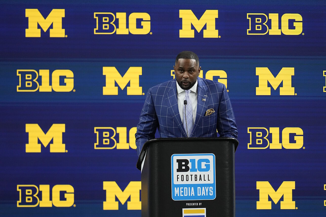 Michigan head coach Sherrone Moore speaks during an NCAA college...