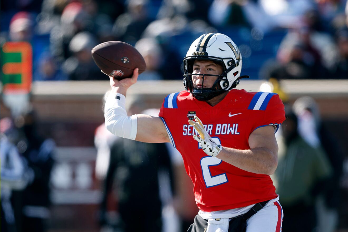 National Team quarterback Diego Pavia (2), of Vanderbilt, throws a...