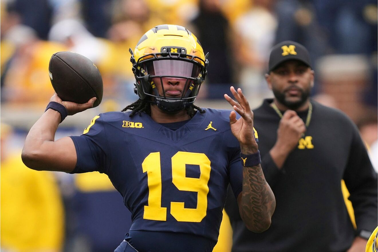 Michigan quarterback Bryce Underwood throws during an NCAA college...