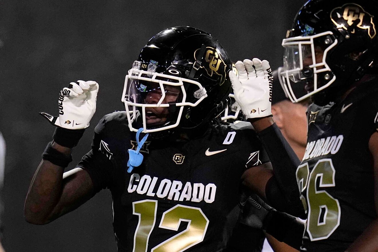Colorado receiver Travis Hunter celebrates a touchdown during the...