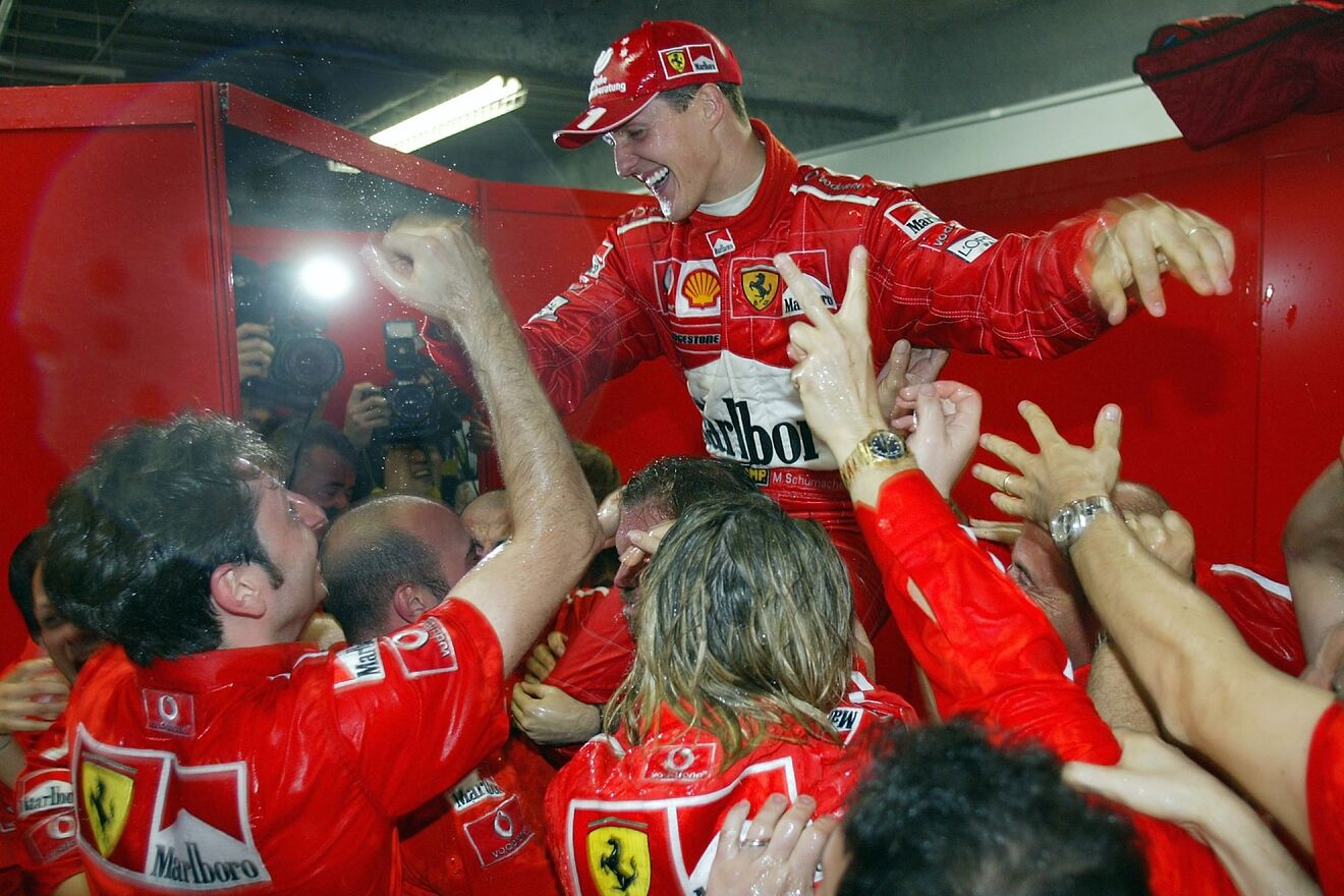 Michael Schumacher celebrating another championship.