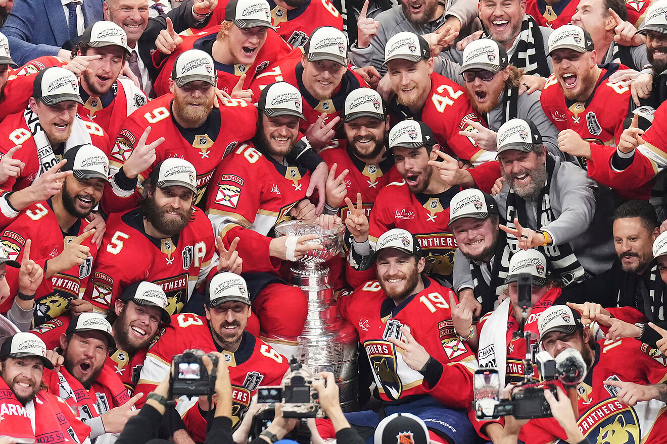 The Florida Panthers celebrate with the Stanley Cup after defeating...