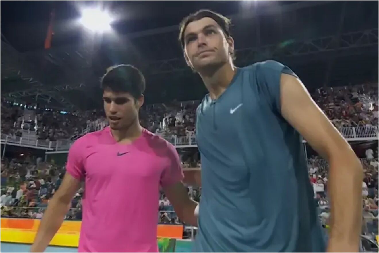 Fritz and Alcaraz greet each other after a match.