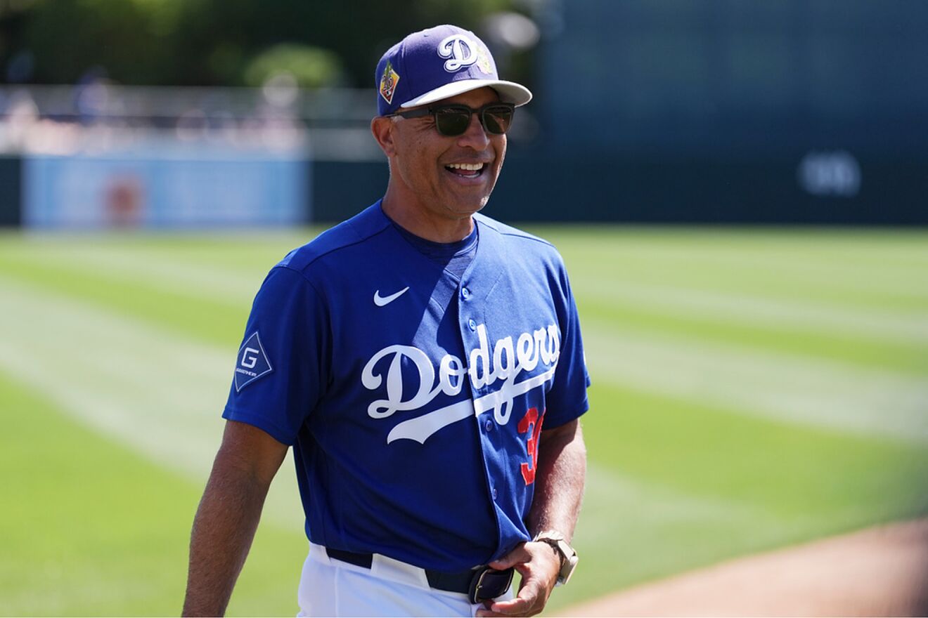 Los Angeles Dodgers manager Dave Roberts smiles