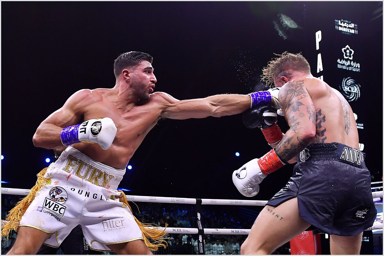 Jake Paul, right, and Tommy Fury, in action during their boxing match,...
