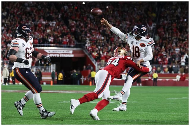 Chicago Bears quarterback Caleb Williams passes while pressured by San Francisco 49ers defensive end Yetur Gross-Matos