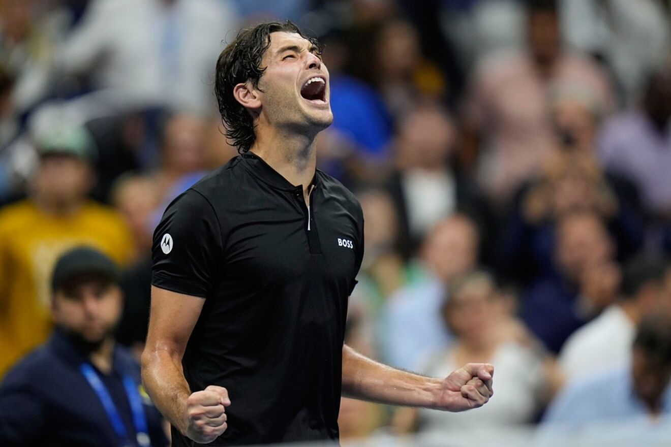 Taylor Fritz, of the United States, reacts after defeating Frances...