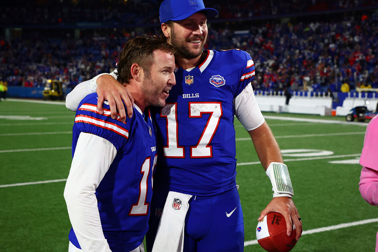 Bills quarterback Josh Allen (17) celebrates with kicker Matt Prater...