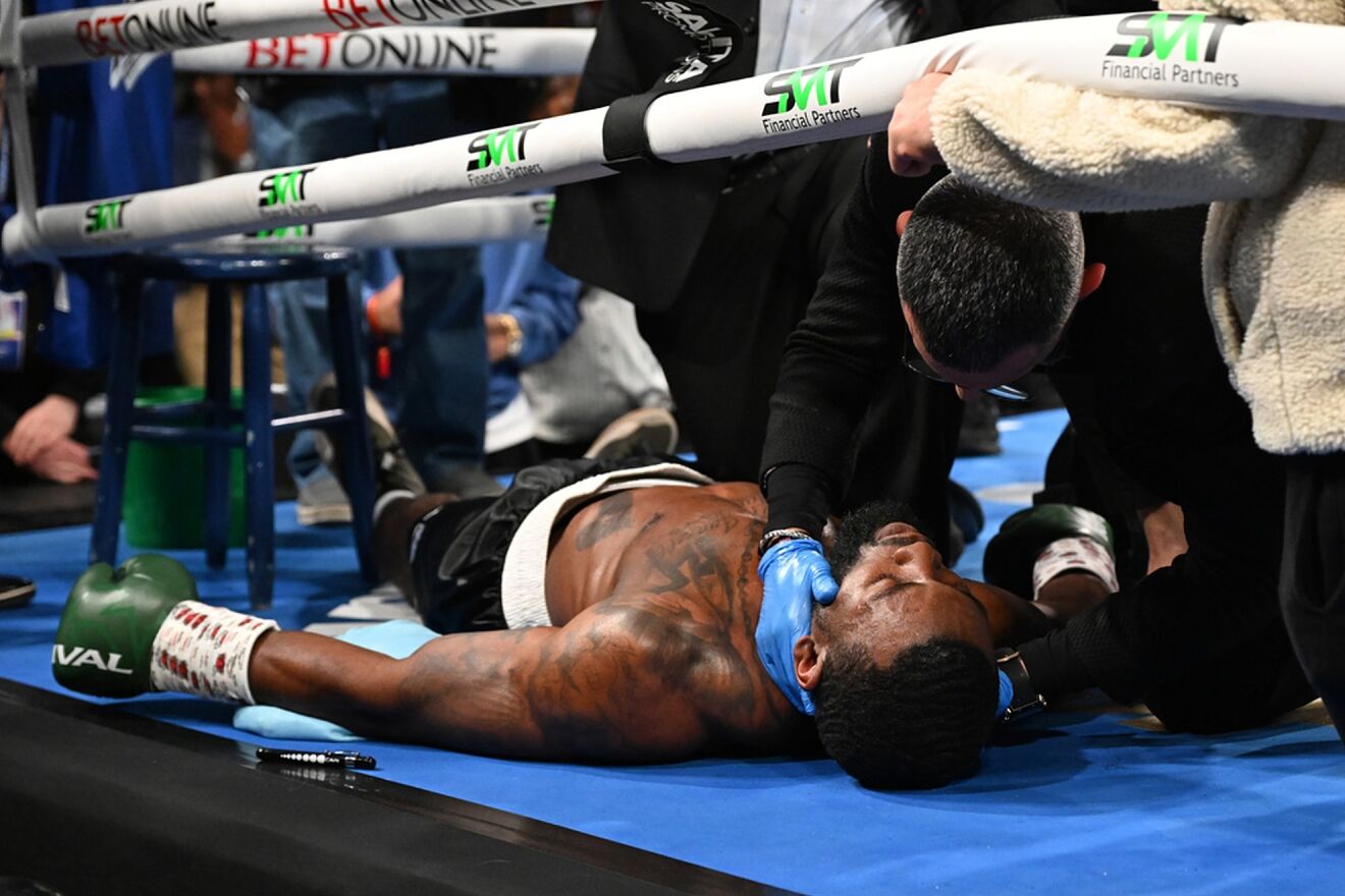 Joe George Jr. was stretchered out after fainting in his corner during...