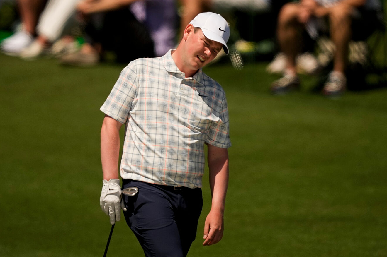Robert MacIntyre laments a missed putt at the 2026 Masters Tournament.
