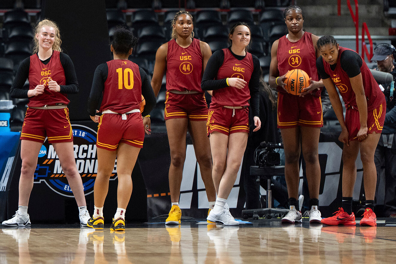 Southern California players run drills during practice before the...